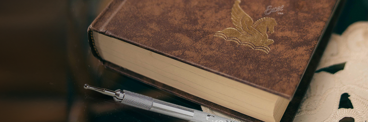 Book with an Excel Blades embossing stylus tool.