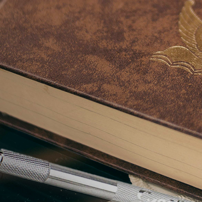 Book with an Excel Blades embossing stylus tool.