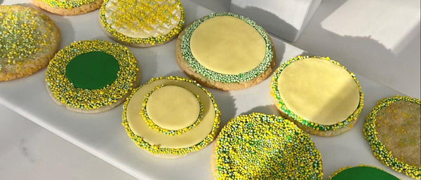 a plate of decorated cookies